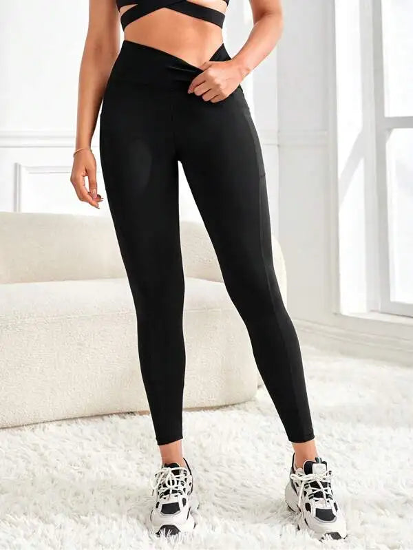 Legging de yoga taille haute uni avec poches, coupe slim pour femme