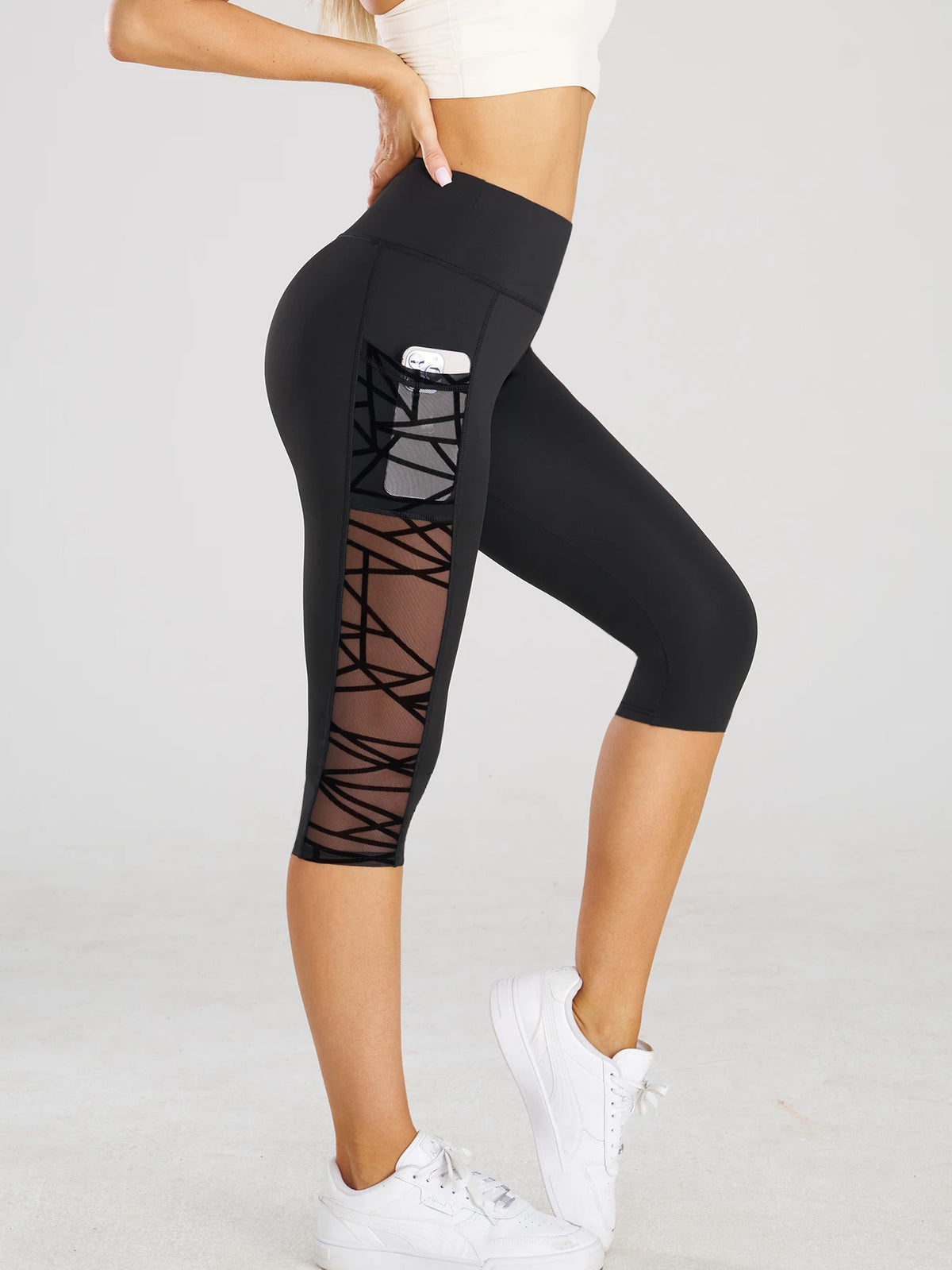 Legging de sport taille haute court avec poches pour le yoga et le fitness